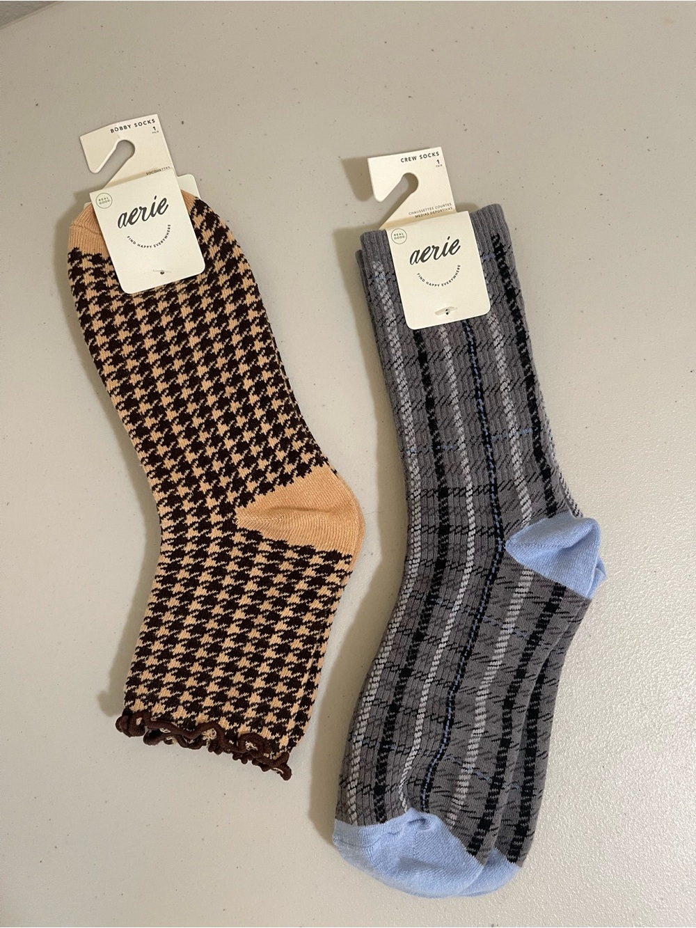 Two pairs of Aerie socks for fall: blue plaid and brown herringbone